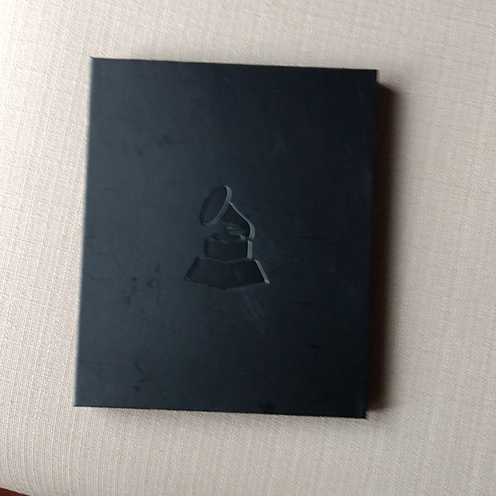 Poppin "Recording Academy" notebook and pen set.